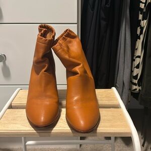 Charlotte Stone orange booties